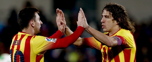 messi-puyol490epa