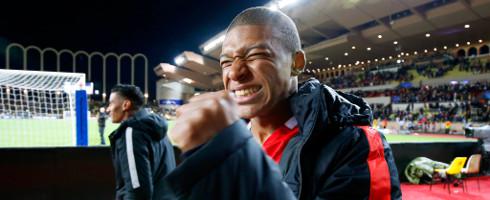 Mbappe-coat-hee-epa_1
