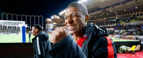 Mbappe-coat-hee-epa_1
