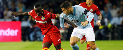 Getafe's Amath Ndiaye vies with Hugo Mallo of Celta Vigo