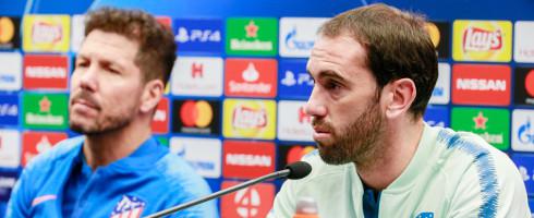 Atletico Madrid boss Diego Simeone with Diego Godin