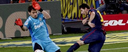 Iker Casillas of Real Madrid and Barcelona star Lionel Messi