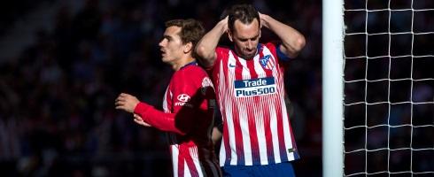 Antoine Griezmann and Diego Godin