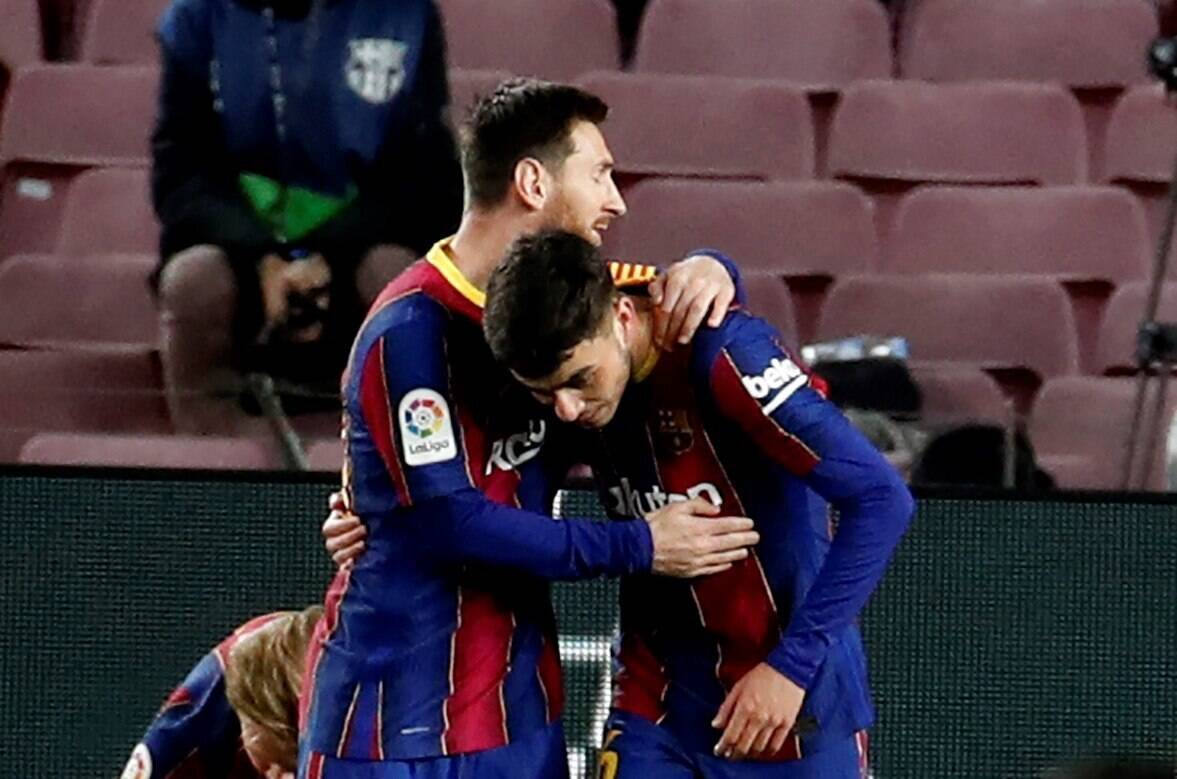 Lionel Messi and Pedri