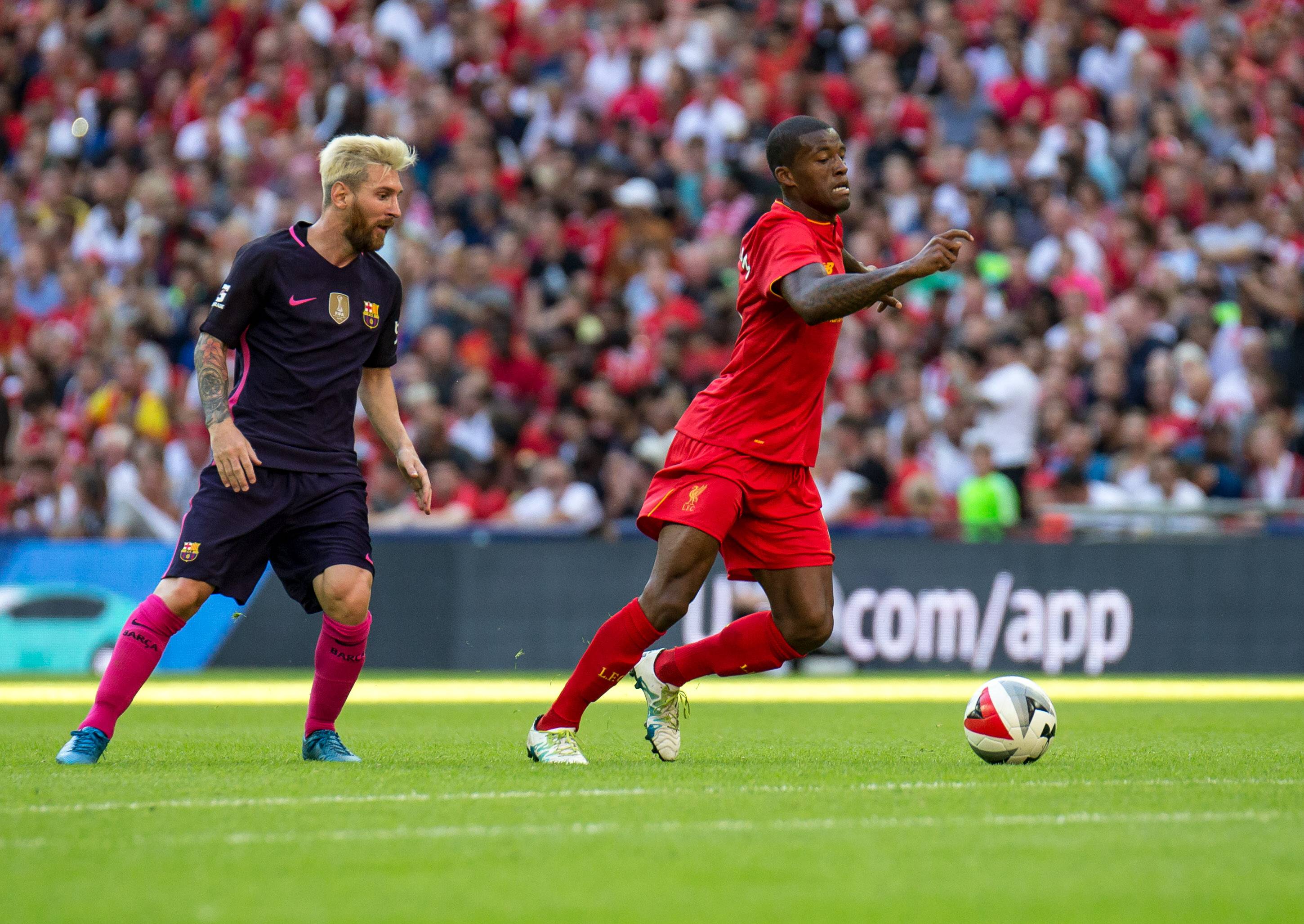 Lionel Messi and Gini Wijnaldum
