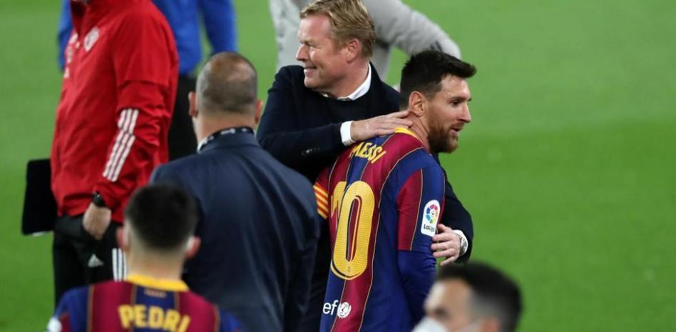 Ronald Koeman and Lionel Messi