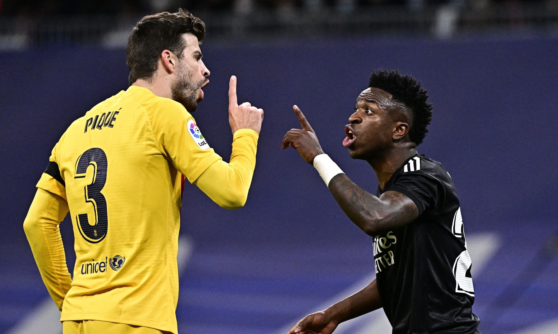 Gerard Pique and Vinicius Jr