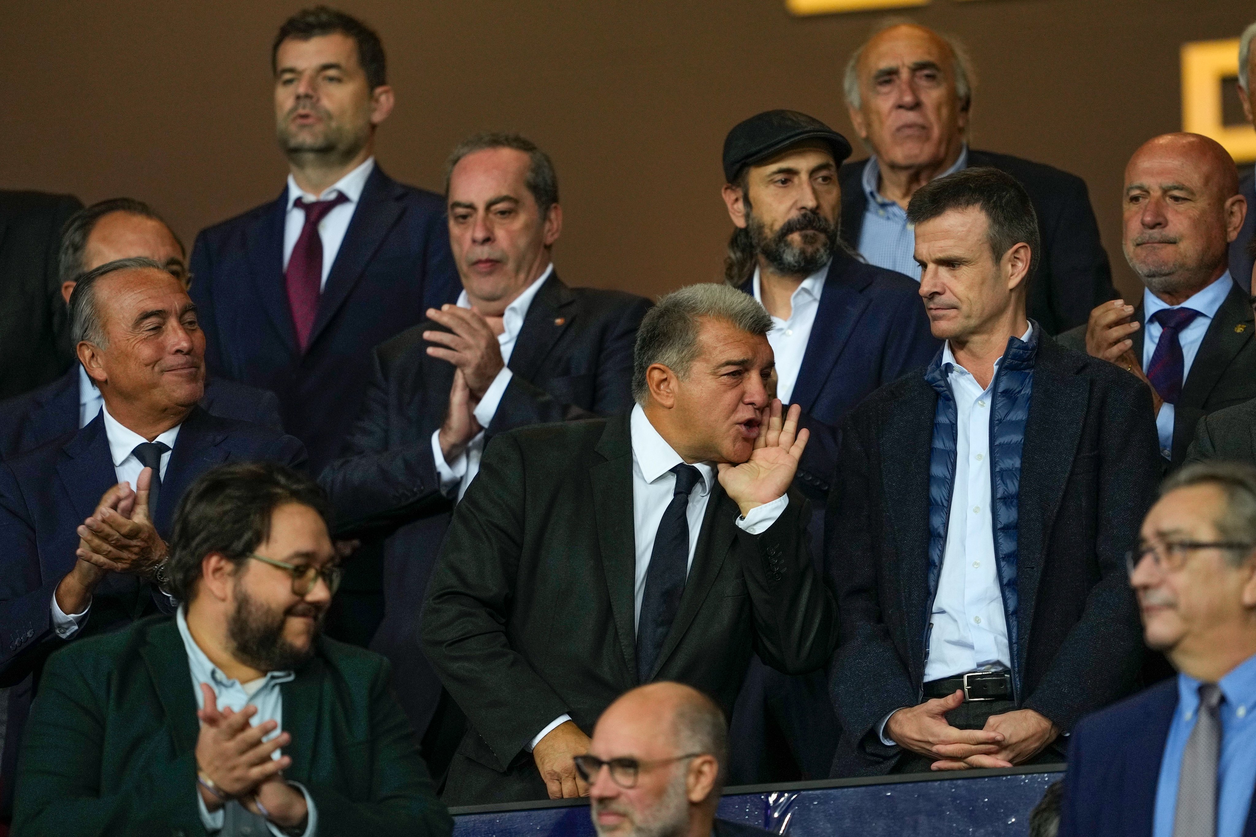 Uriarte and Laporta in the stands.