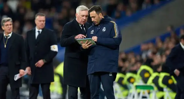 Ancelotti consults with assistant manager Davide Ancelotti