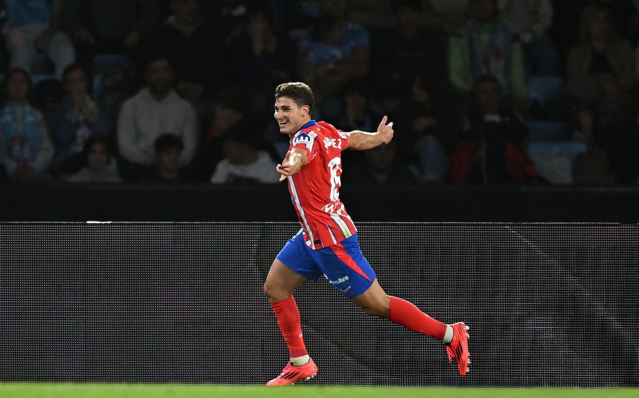Julian Alvarez celebrates.