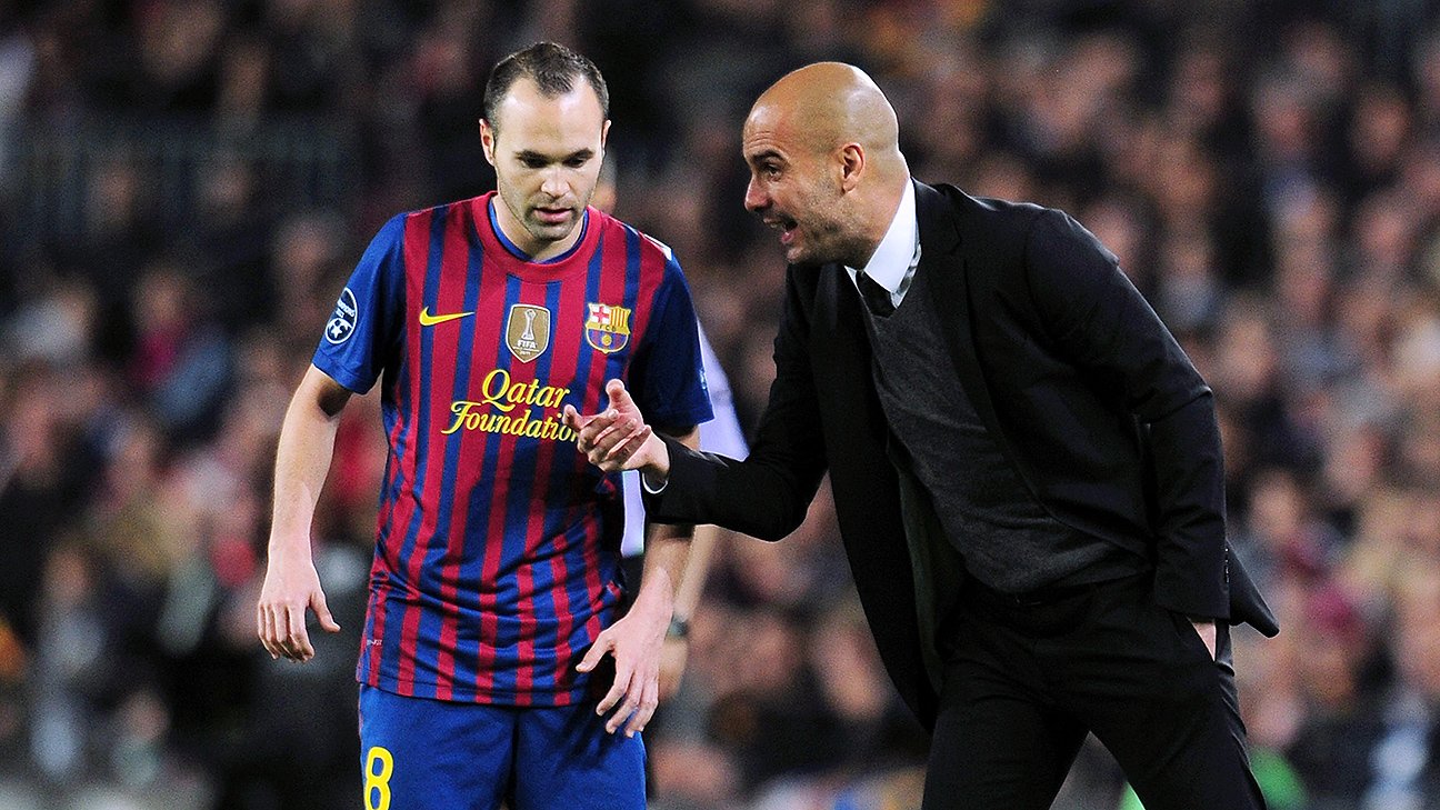 Andres Iniesta and Pep Guardiola