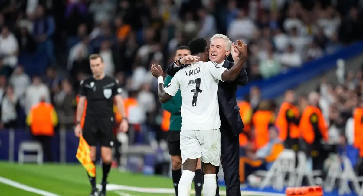 Carlo Ancelotti hugs Vinicius