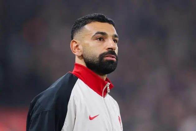 Mohamed Salah walks out at Anfield.