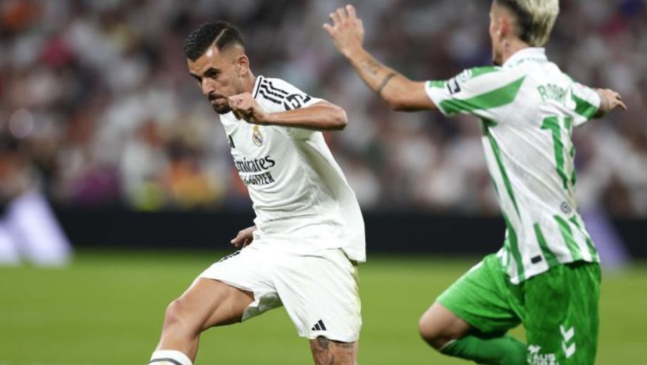 Dani Ceballos takes on Real Betis.