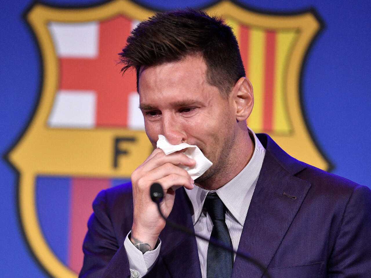 Messi in tears as he leaves Barcelona.