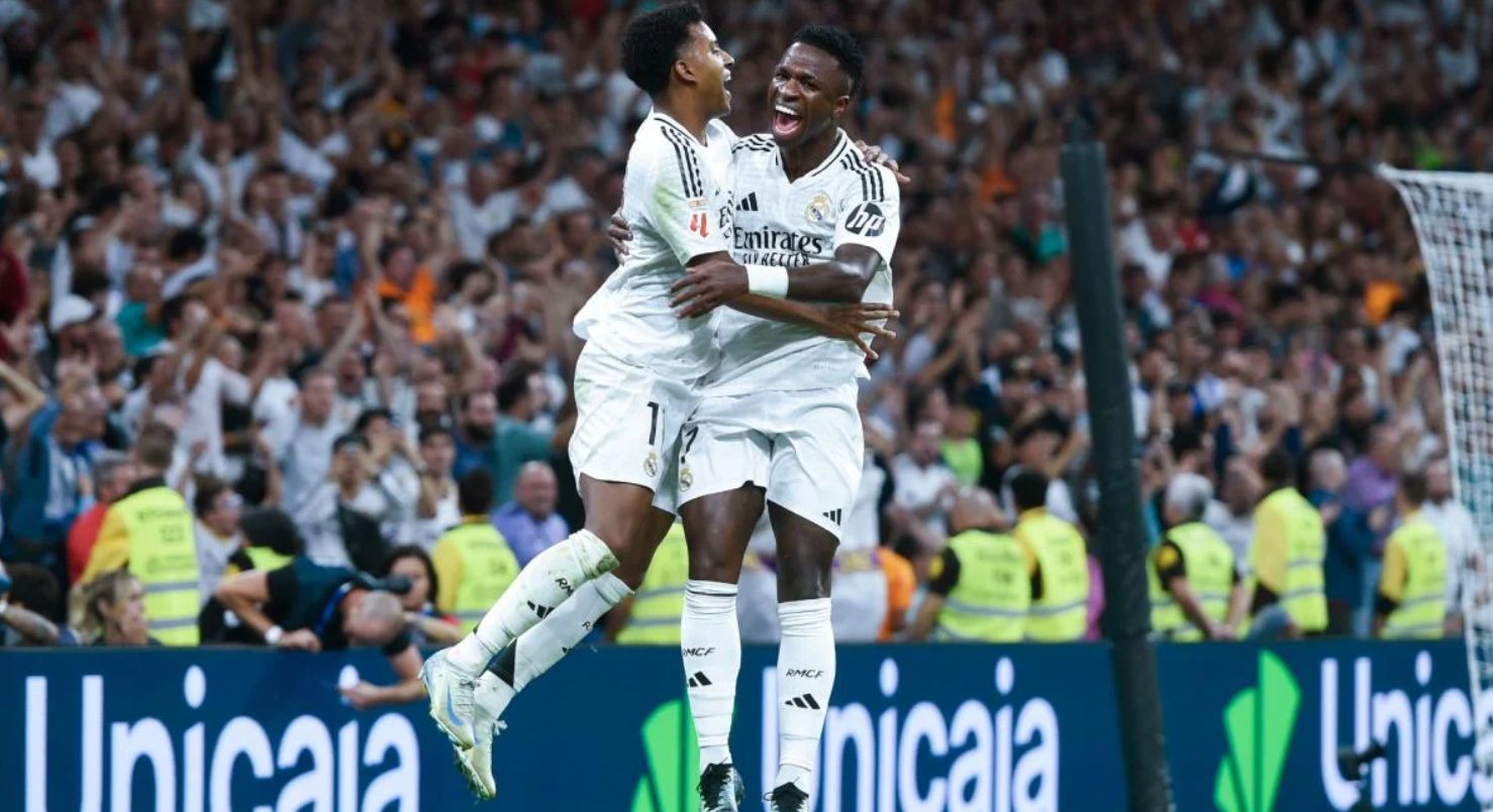 Rodrygo and Vinicius celebrate.