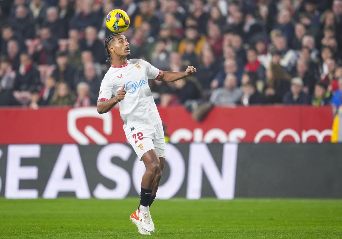 Bade controls the ball with his head.