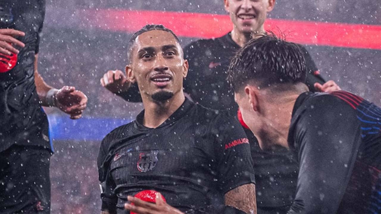 Raphinha celebrates his goal in Lisbon.