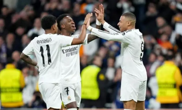 Rodrygo, Mbappe and Vinicius celebrate.