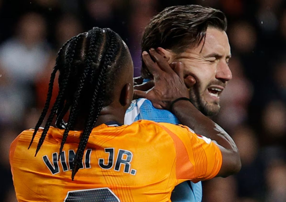 Vinicius in an altercation with Stole Dimtrievski