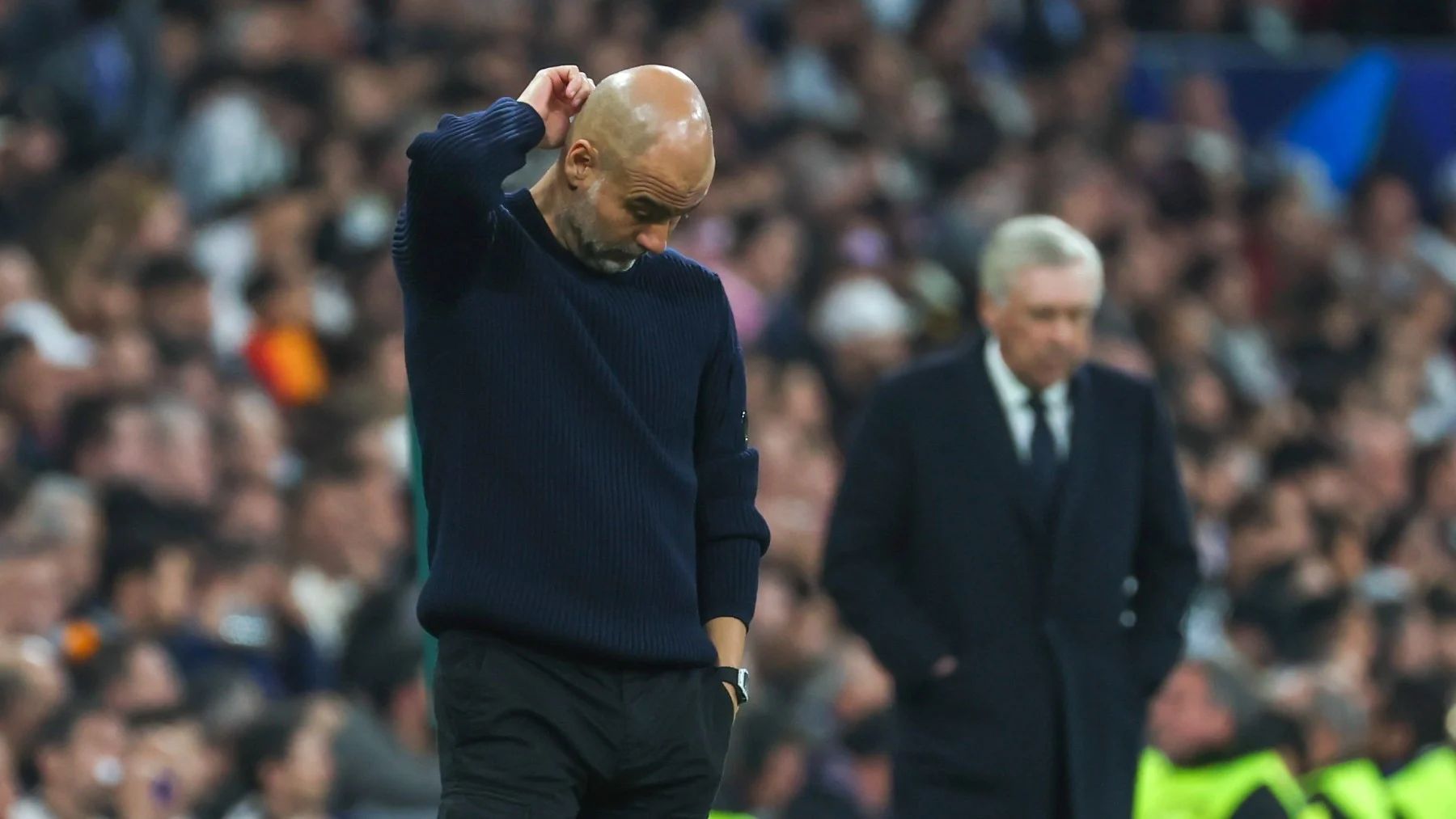 Guadiola scratches head at Bernabeu.