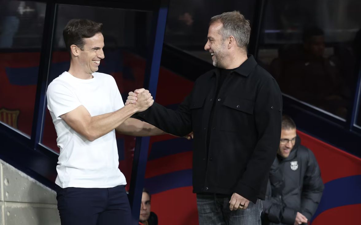 Perez shakes hands with Flick.