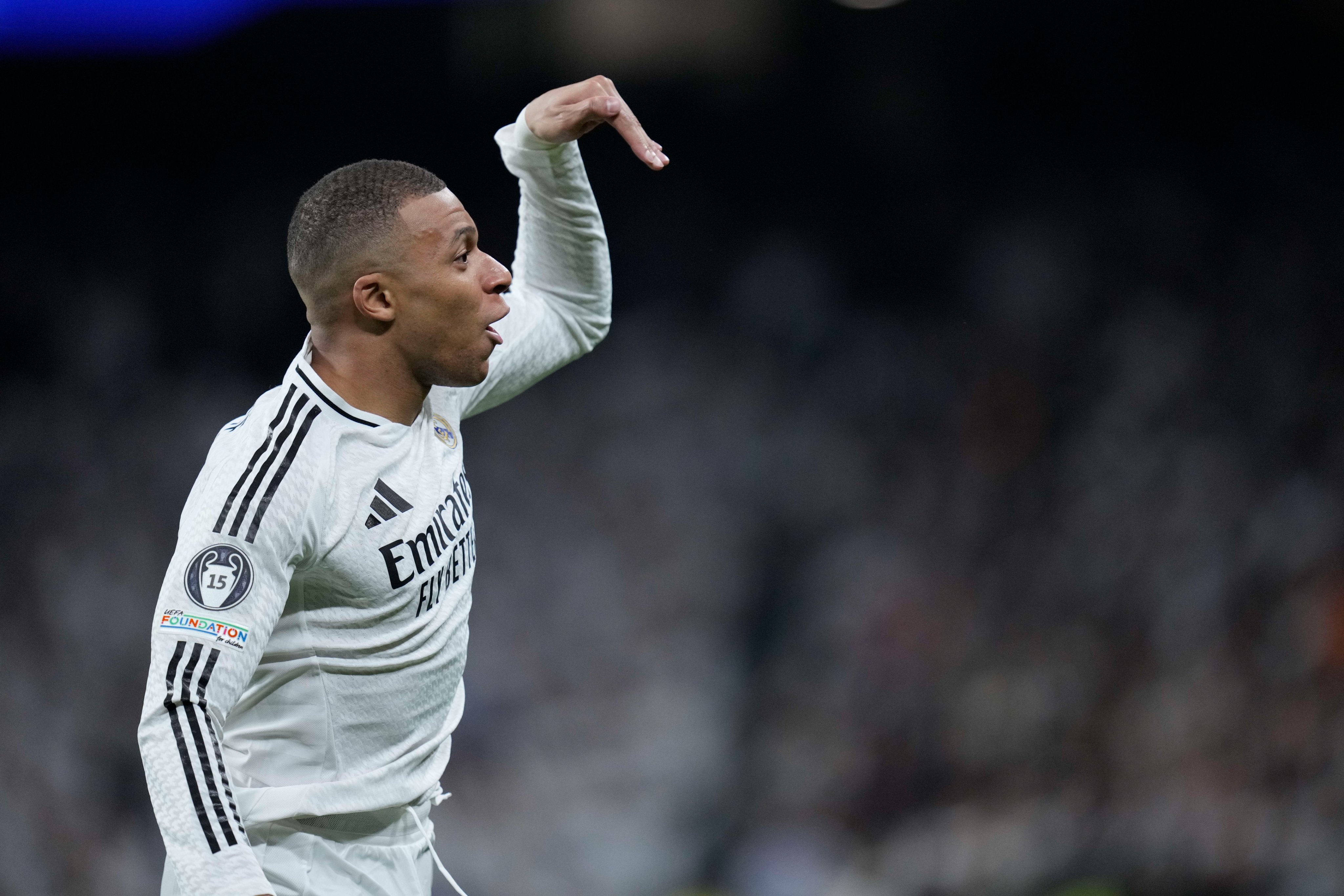 Kylian Mbappe celebrates against Manchester City