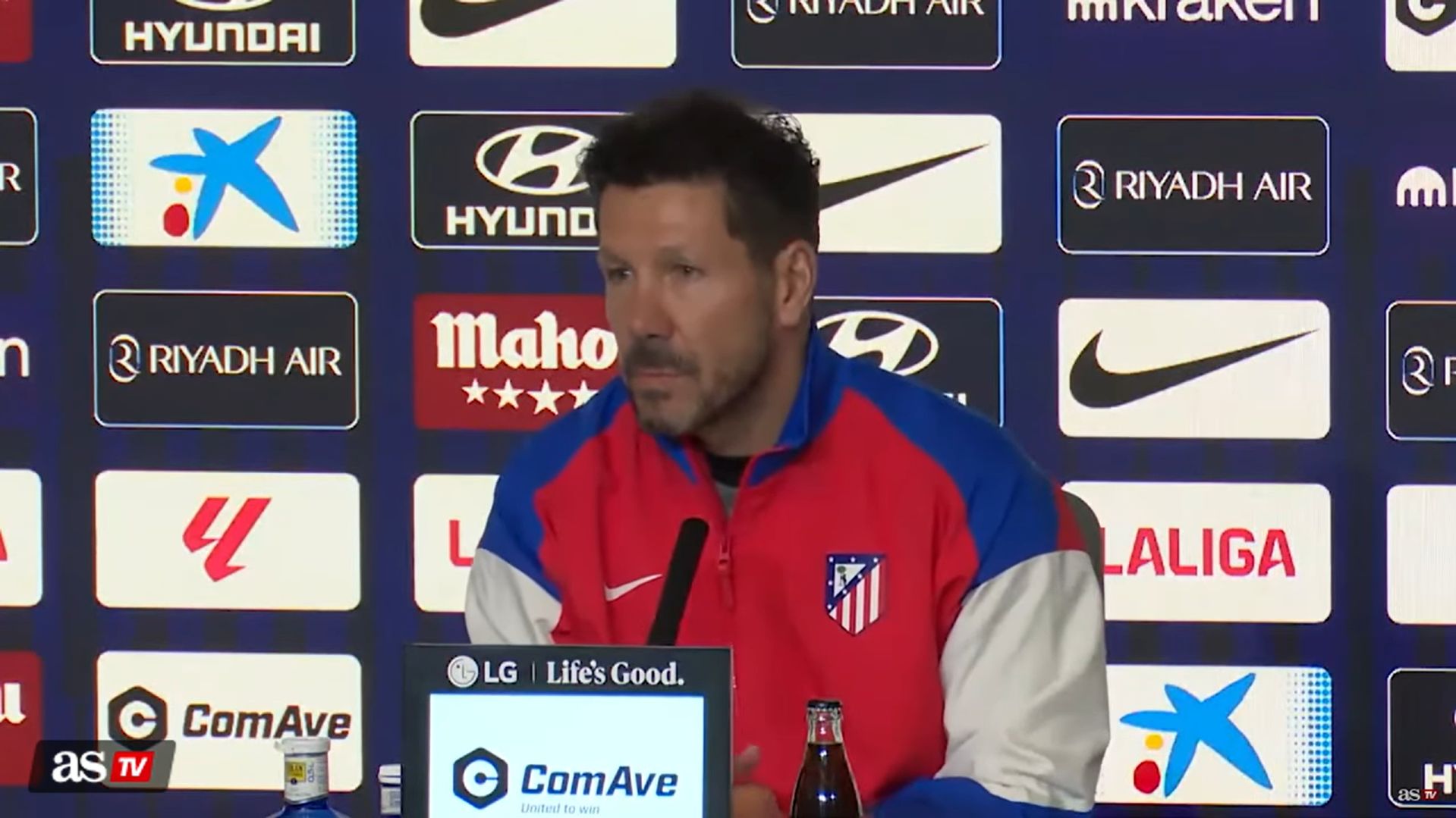 Simeone speaks to the press.