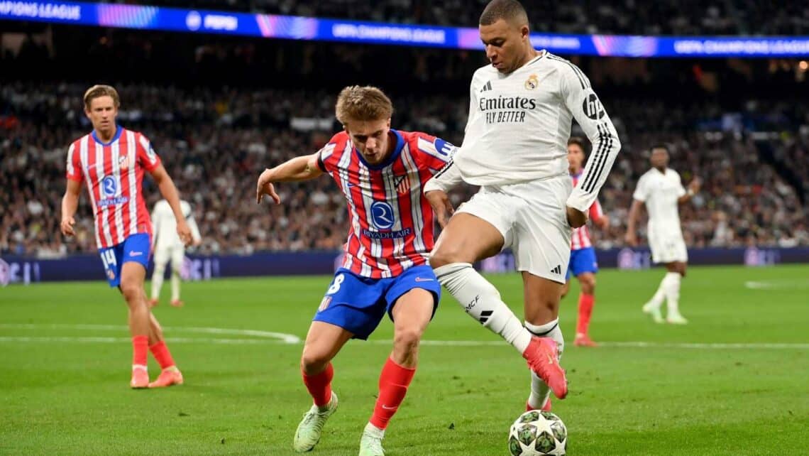 Mbappe takes on Pablo Barrios.