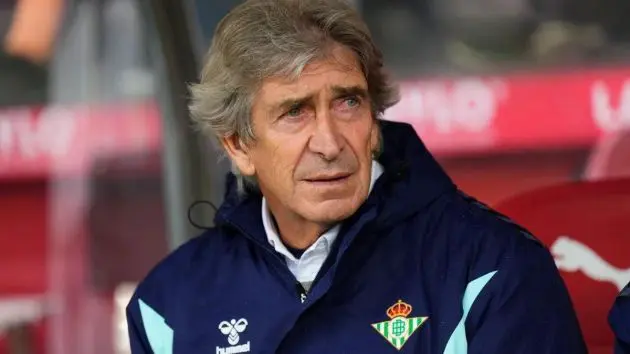 Manuel Pellegrini looks on from the bench.