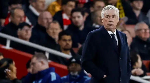 Ancelotti looks into the distance.