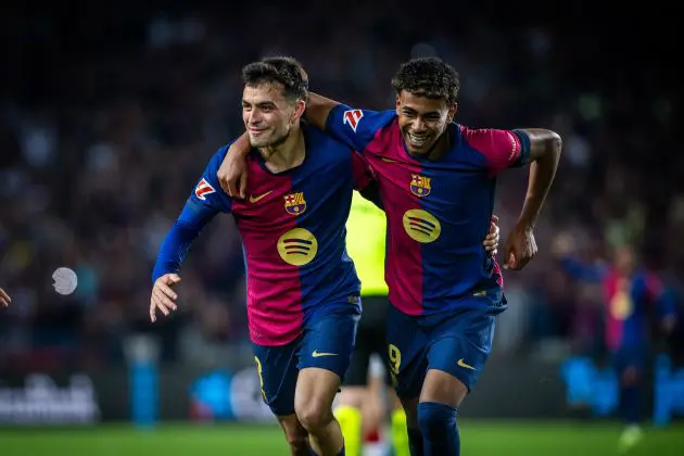 Pedri celebrates with Lamine Yamal.