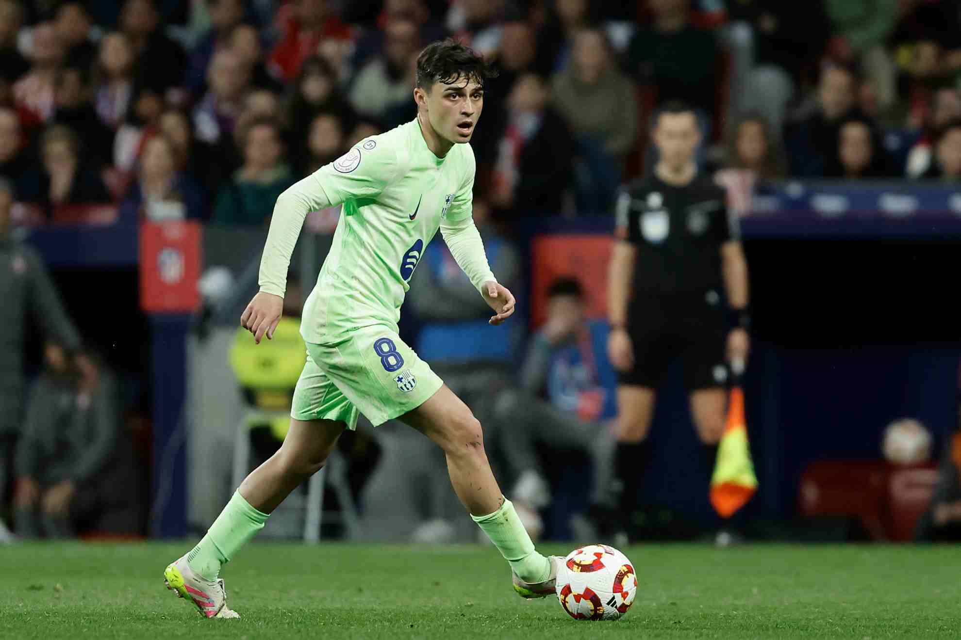 Pedri on the ball against Atletico Madrid.