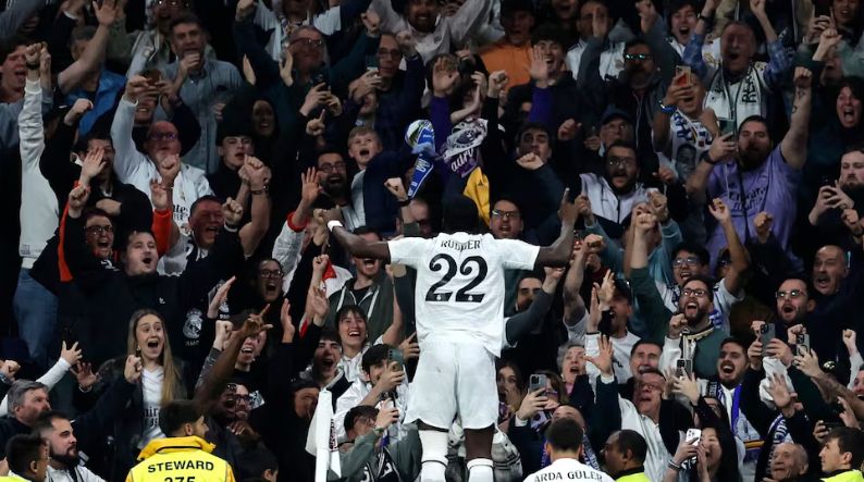 Rudiger celebrates at the Bernabeu.