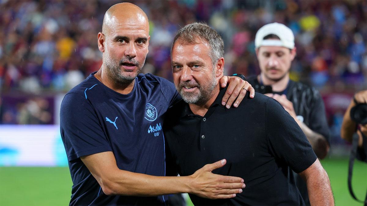 Guardiola speaks with Hansi Flick.