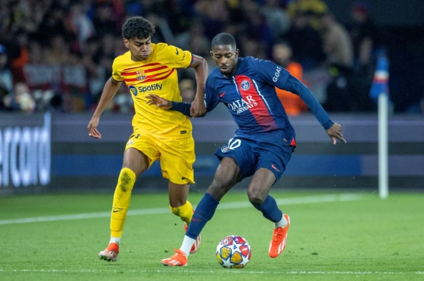 Dembele in action against Barcelona