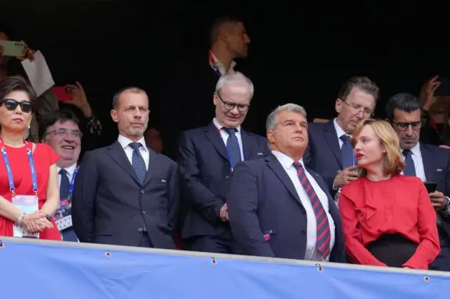Laporta and Ceferin sit together in the Champions League.