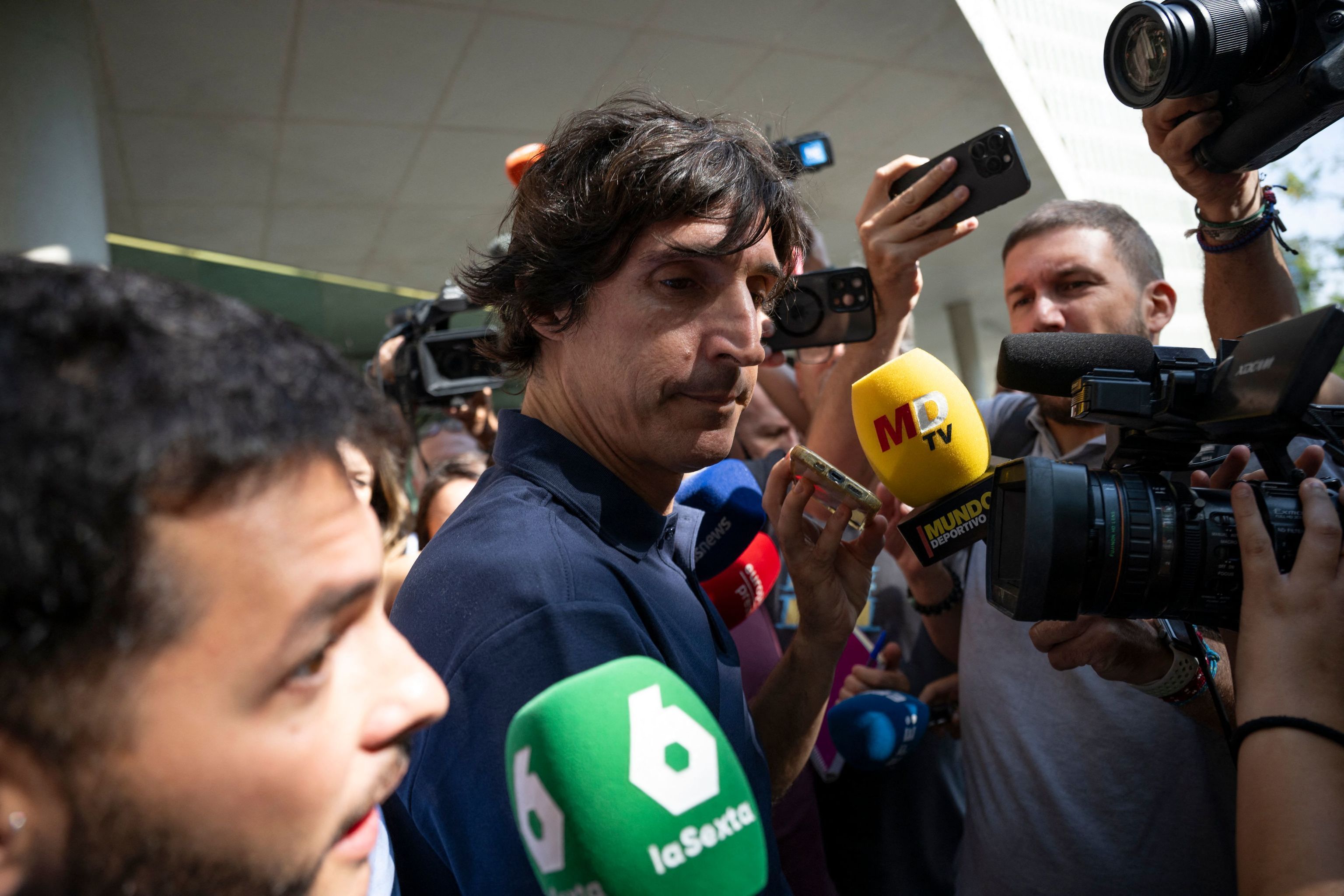 Enriquez Romero leaves court after giving evidence.