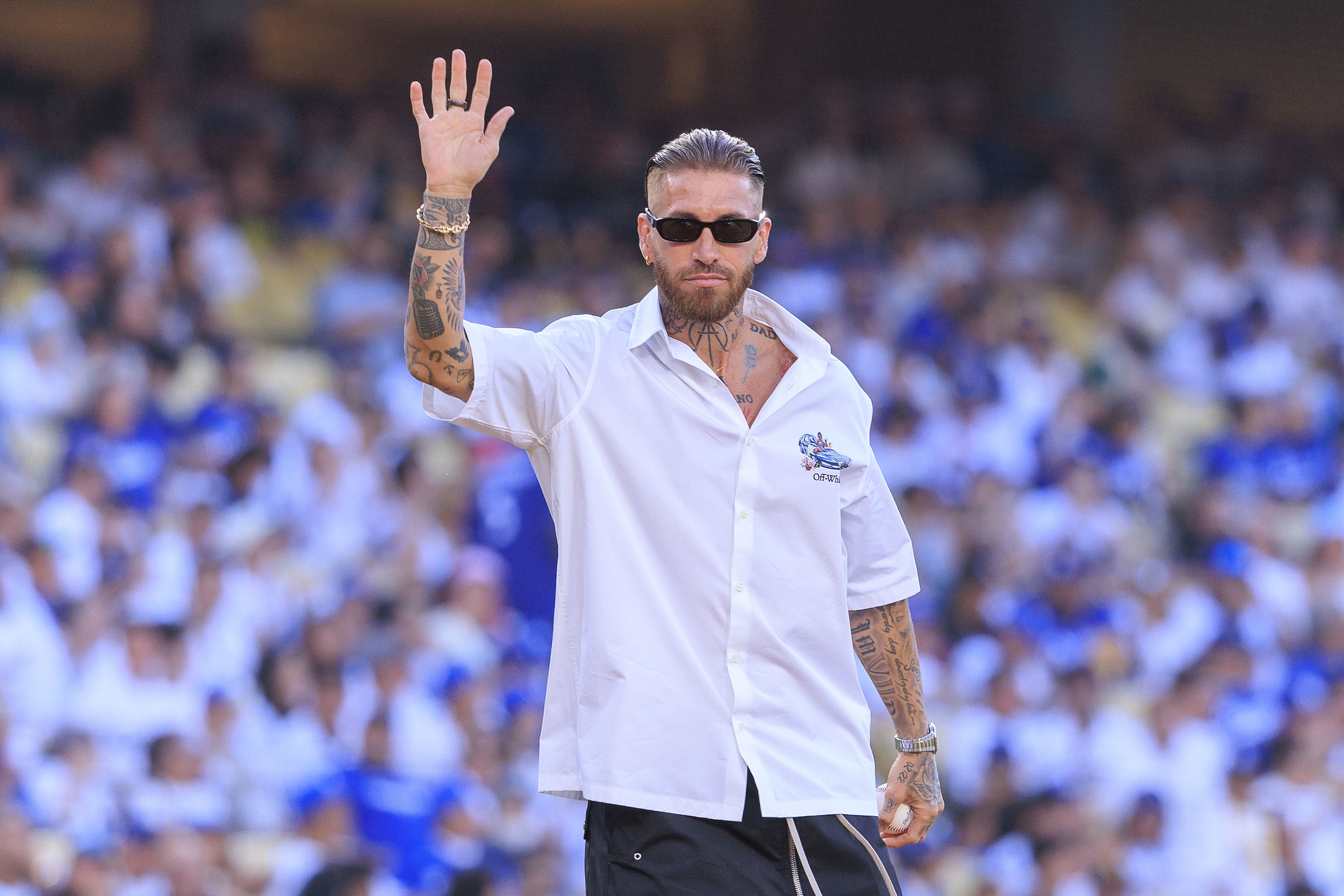Sergio Ramos playing baseball throws the honorary first pitch prior to the regular season MLB game between the Los Angeles Dodgers and the San Diego Padres on Wednesday June 18, 2025 at Dodger Stadium in Los Angeles,