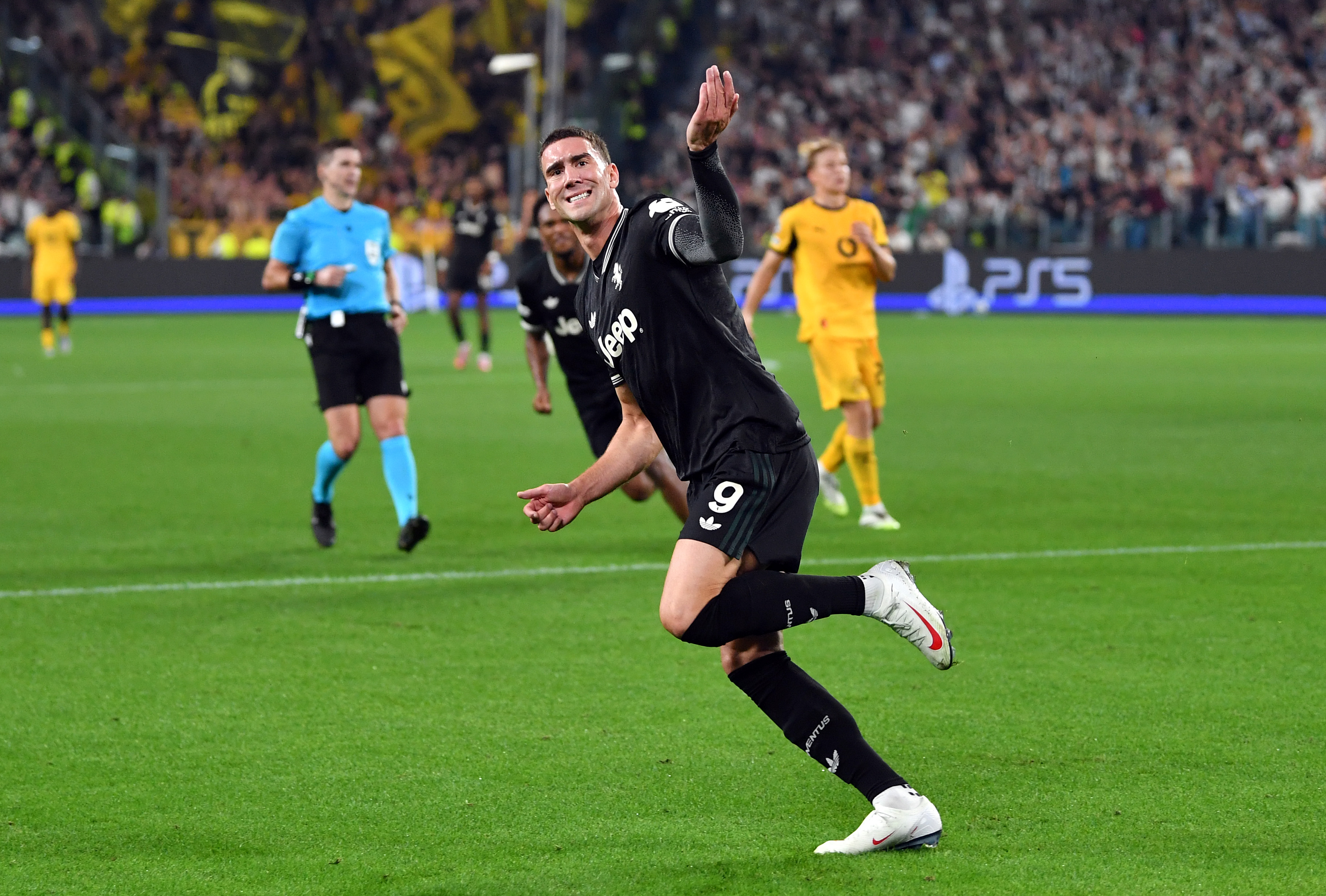 Vlahovic celebrates.