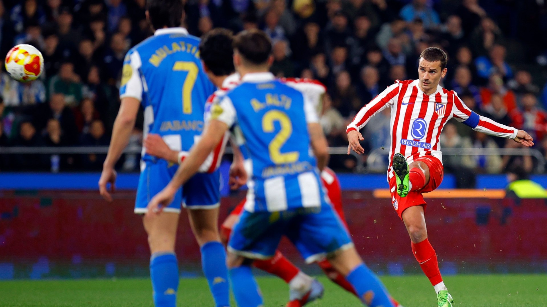 Griezmann curls a brilliant free-kick.