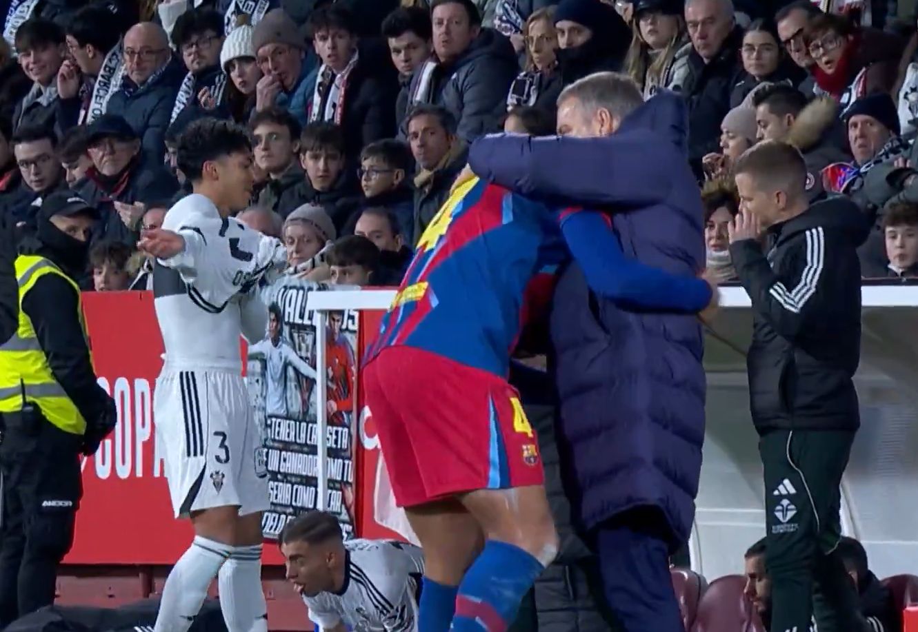 Araujo hugs Flick.