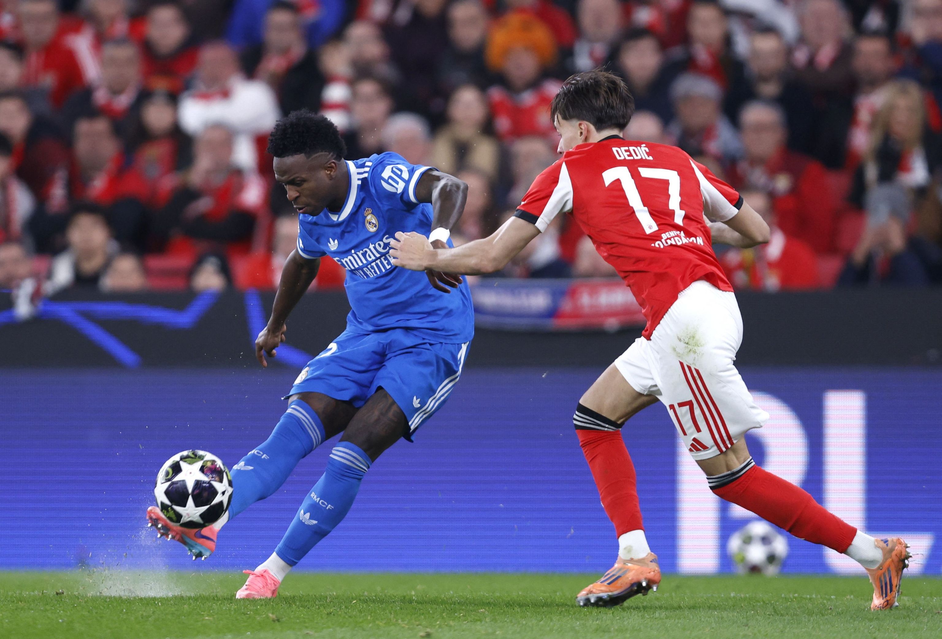 Vinicius curls in the winner.