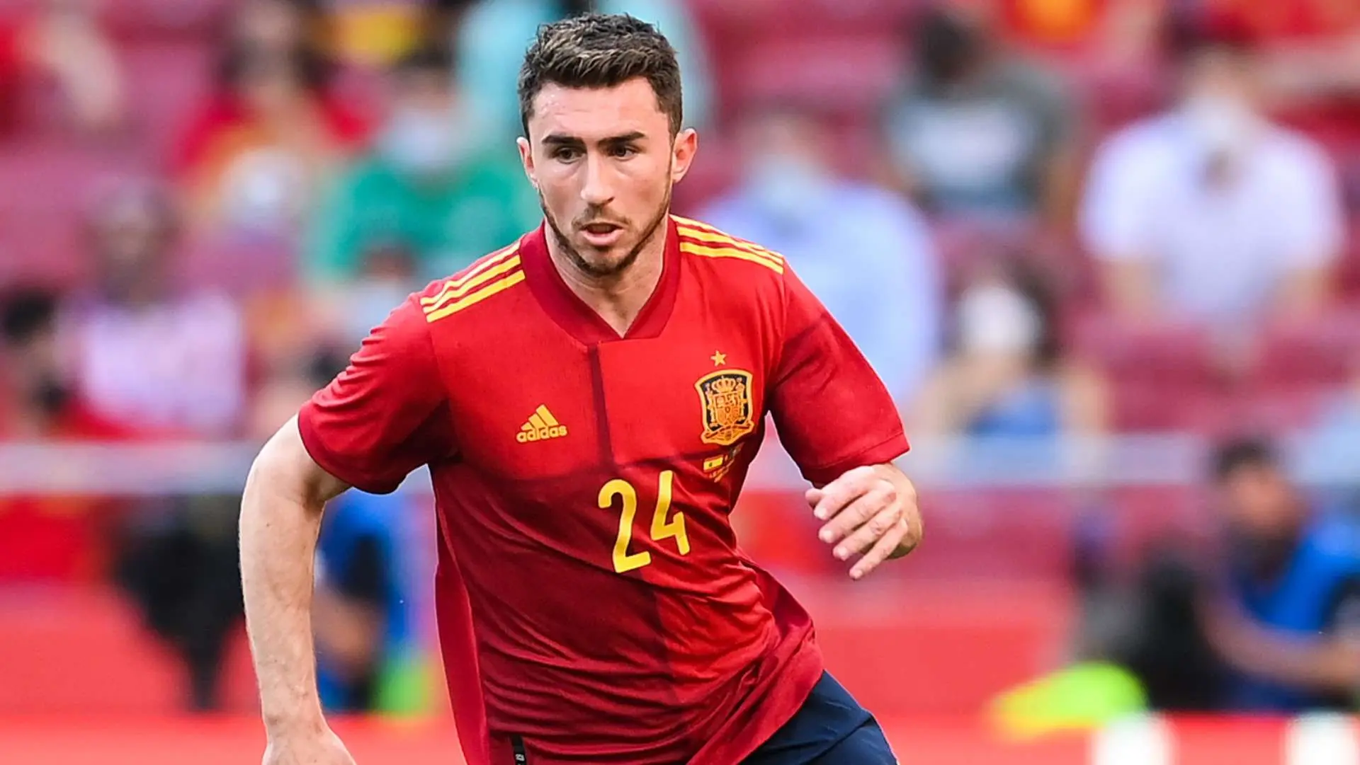 Aymeric Laporte in Spain national team jersey during a match.