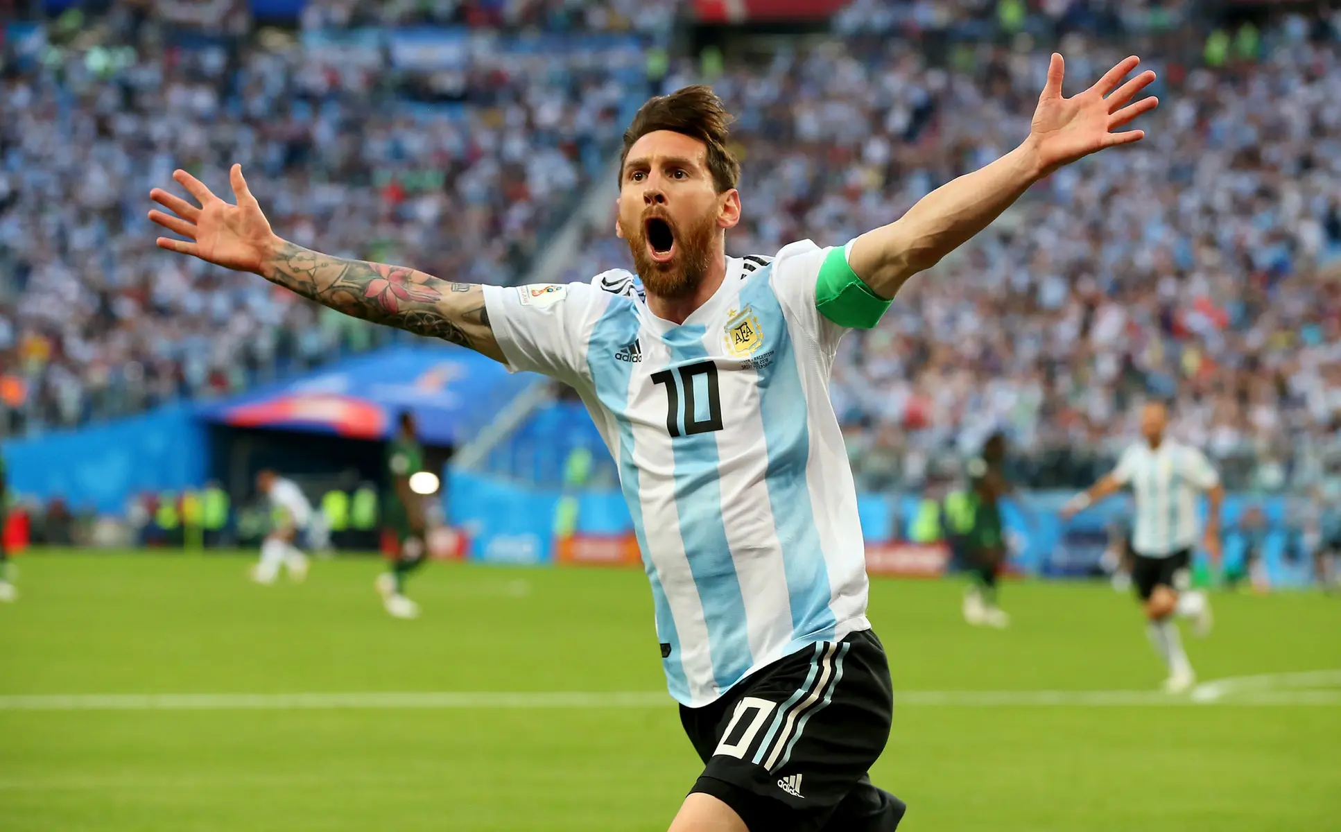 Lionel Messi celebrating during a match for the Argentina national team.