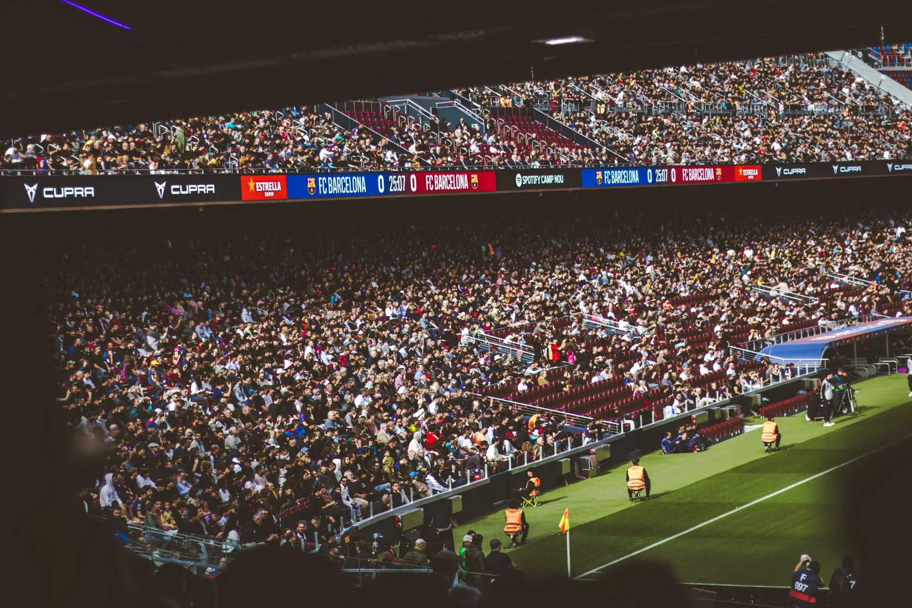 Wide shot of a crowded football stadium during an FC Barcelona match at Spotify Camp Nou
